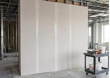 Finished drywall partition, taped and ready for paint
